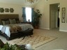 AFTER: Custom House Completed and Staged (Master Bedroom)